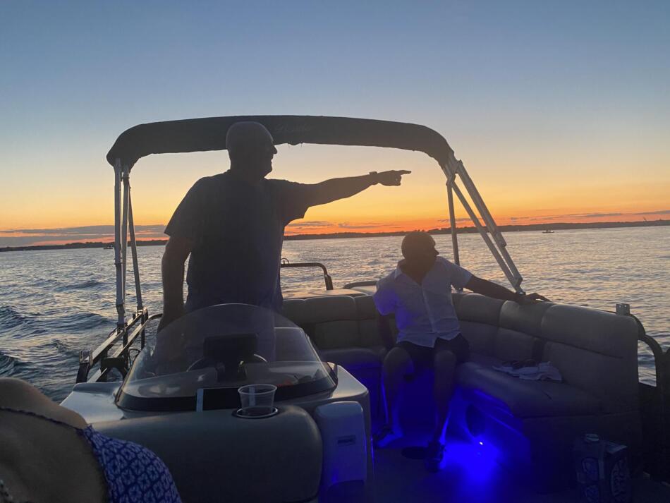 Sunset cruise on Party Pontoon boat rentals.