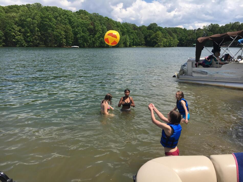 Playing on the sandbar with Party Pontoon boat rentals..